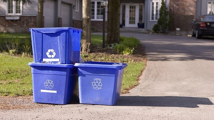 Recycling bins stacked