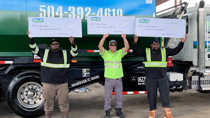 From left to right: Bruce Green, Brian Tonglet, Kendall Coleman receive their award.