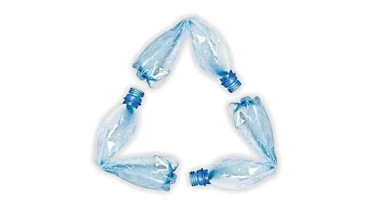 blue pet bottles arranged like chasing arrow recycling symbol