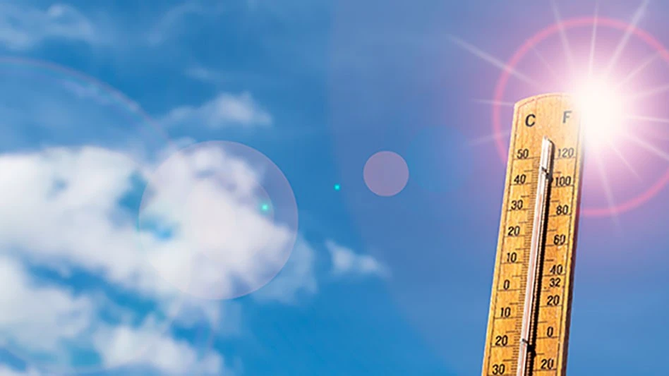 thermometer in front of blue sky with wispy clouds