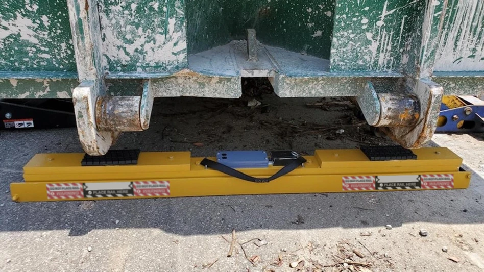 The Wastewizer BinBar under a container