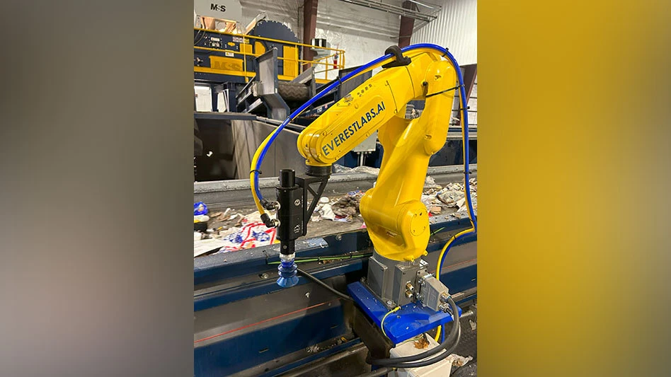 an everestlabs RecycleOS robot on a conveyor belt