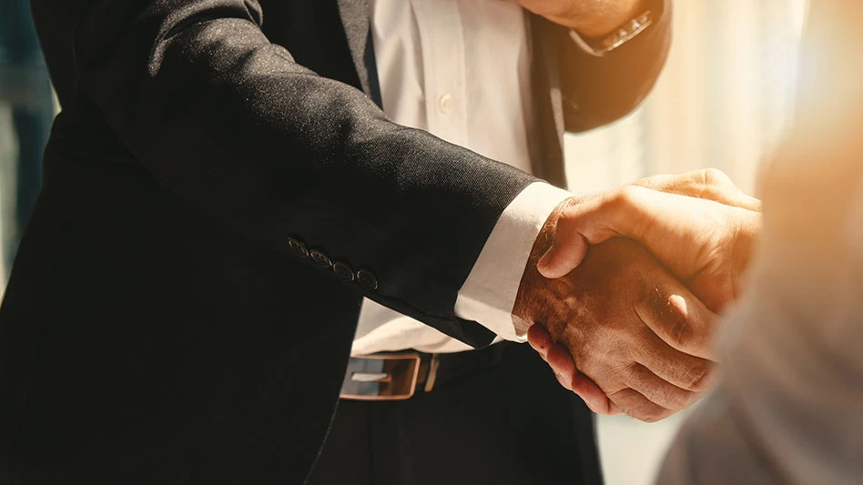 businessman handshake for teamwork of business merger and acquisition